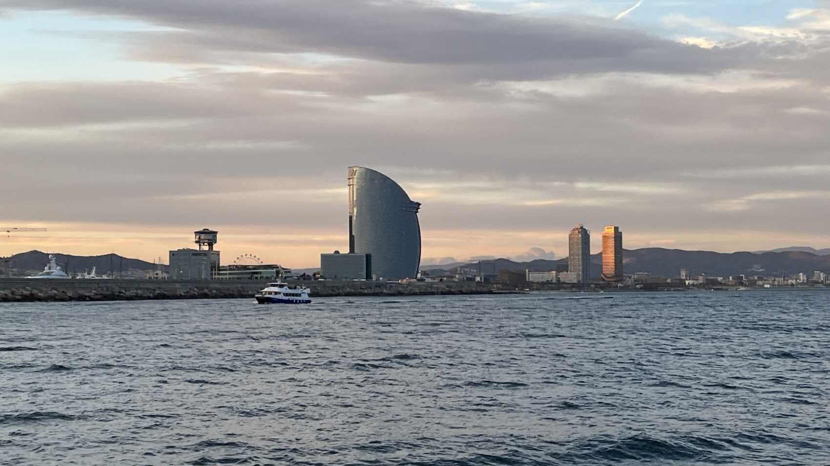 Barcelona-Paseo-Catamaran-skyline-golden